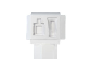 Precision-shaped moulded pulp insert for product protection in rigid boxes.