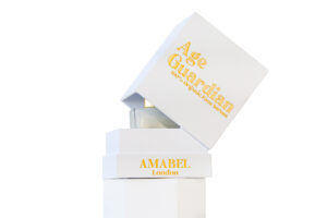 High-end rigid box with a three piece box "Shoulder box" and interior fitments for cosmetics.