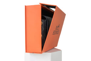Hermes orange color box with a luxurious finish, showcasing elegant packaging.
